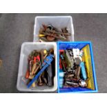 Three plastic crates containing a large quantity of assorted hand tools, bolt cutters,