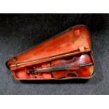 An early 20th century 3/4 size violin with two-piece 13" back, unlabelled,