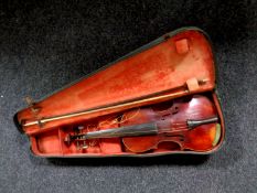 An early 20th century 3/4 size violin with two-piece 13" back, unlabelled,