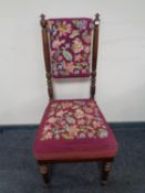 An antique mahogany tapestry upholstered bedroom chair