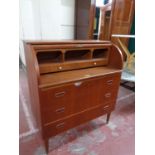 A mid 20th century Danish teak cylinder bureau