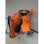 An Alko H1100S garden shredder together with a Flymo garden vacuum and strimmer