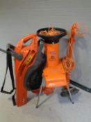 An Alko H1100S garden shredder together with a Flymo garden vacuum and strimmer