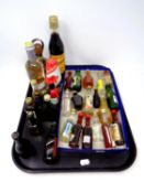 A tray containing a quantity of assorted alcohol miniatures