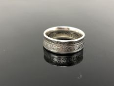 A Victorian 1895 silver half crown ring