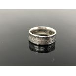 A Victorian 1895 silver half crown ring