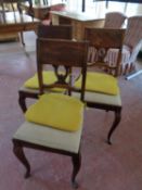 A set of six continental oak dining chairs,