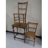 A pair of Edwardian bedroom chairs together with an Edwardian oak occasional table