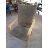 A wood framed high backed adjustable armchair upholstered in a suede fabric