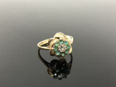 A 9ct gold emerald and diamond cluster ring, size Q CONDITION REPORT: 2.