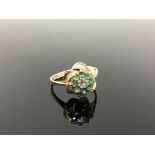 A 9ct gold emerald and diamond cluster ring, size Q CONDITION REPORT: 2.