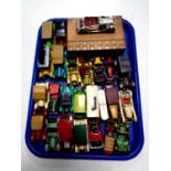 A tray containing die cast vehicles by Lesney and Matchbox classic cars together with a wooden