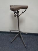 A wrought iron retro style bar stool