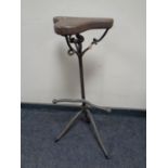 A wrought iron retro style bar stool