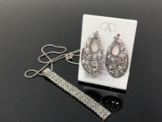 A sterling silver marquisette necklace and pendant with similar earrings