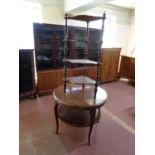 An early 20th century circular mahogany two tier occasional table together with a 19th century four