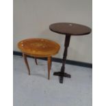 An antique pedestal occasional table together with an Italian style musical occasional table