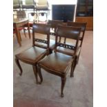 A set of seven early 20th century continental oak dining chairs