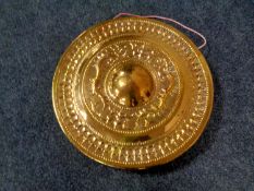 A Tibetan style brass gong embossed with dragons