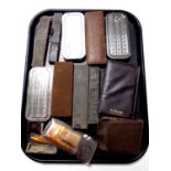 A tray of cut throat razor, Rolls razor, sharpening stone, cased cheroot with silver mount,