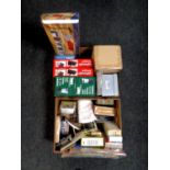 Two boxes of boxed LED lanterns, carpet sweeper, Tens unit, storage boxes, place mats,