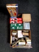 Two boxes of boxed LED lanterns, carpet sweeper, Tens unit, storage boxes, place mats,