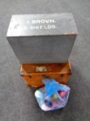 A wooden crate containing wool together with a 20th century shipping trunk