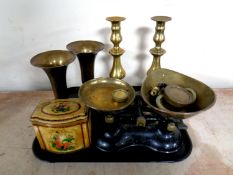 A tray of assorted brass wares to include antique brass candlesticks, Indian brass vases,