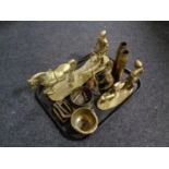 A tray containing antique and later brass ware to include ammunition shell casings,