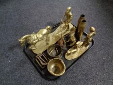 A tray containing antique and later brass ware to include ammunition shell casings,