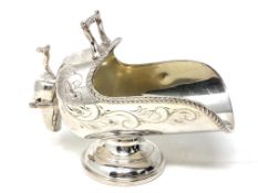 A good quality silver plated sugar scuttle