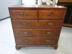 A George III oak five drawer chest