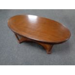 An inlaid oval coffee table