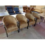 A set of four wicker conservatory armchairs