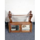 An Edwardian mahogany mirror door wall cabinet,