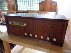 A mid 20th century teak cased valve radio