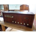 A mid 20th century teak cased valve radio