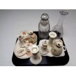 A tray containing two cut glass decanters with stoppers,