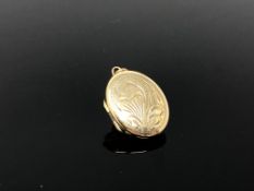 An antique rolled gold locket