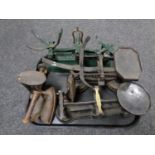A tray of three sets of vintage kitchen scales together with a flat iron