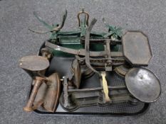 A tray of three sets of vintage kitchen scales together with a flat iron