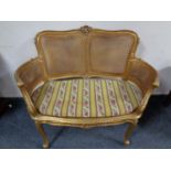 A French gilt wood bergere backed window seat