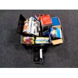 A box containing miscellaneous to include external hard drive, router, portable megaphone,