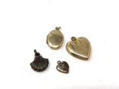 Four vintage lockets