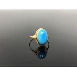 An 18ct gold cabochon turquoise ring,