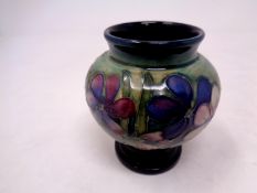 A Moorcroft pottery squat vase, height 8.