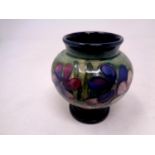 A Moorcroft pottery squat vase, height 8.