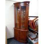 A Strong Bow Furniture double door glazed corner cabinet,