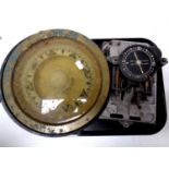 A 20th century brass ship's compass together with a further compass with mechanism