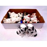 A box containing five pairs of Staffordshire style dogs together with one other